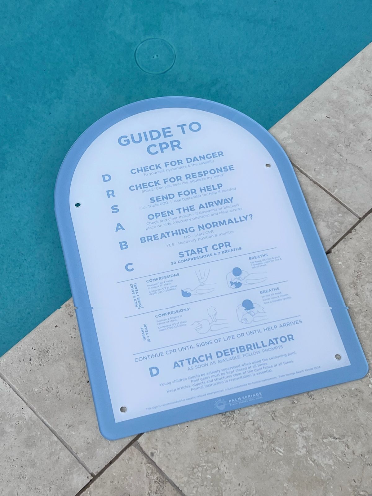 CPR Pool Sign The Halo - Blue & White near pool