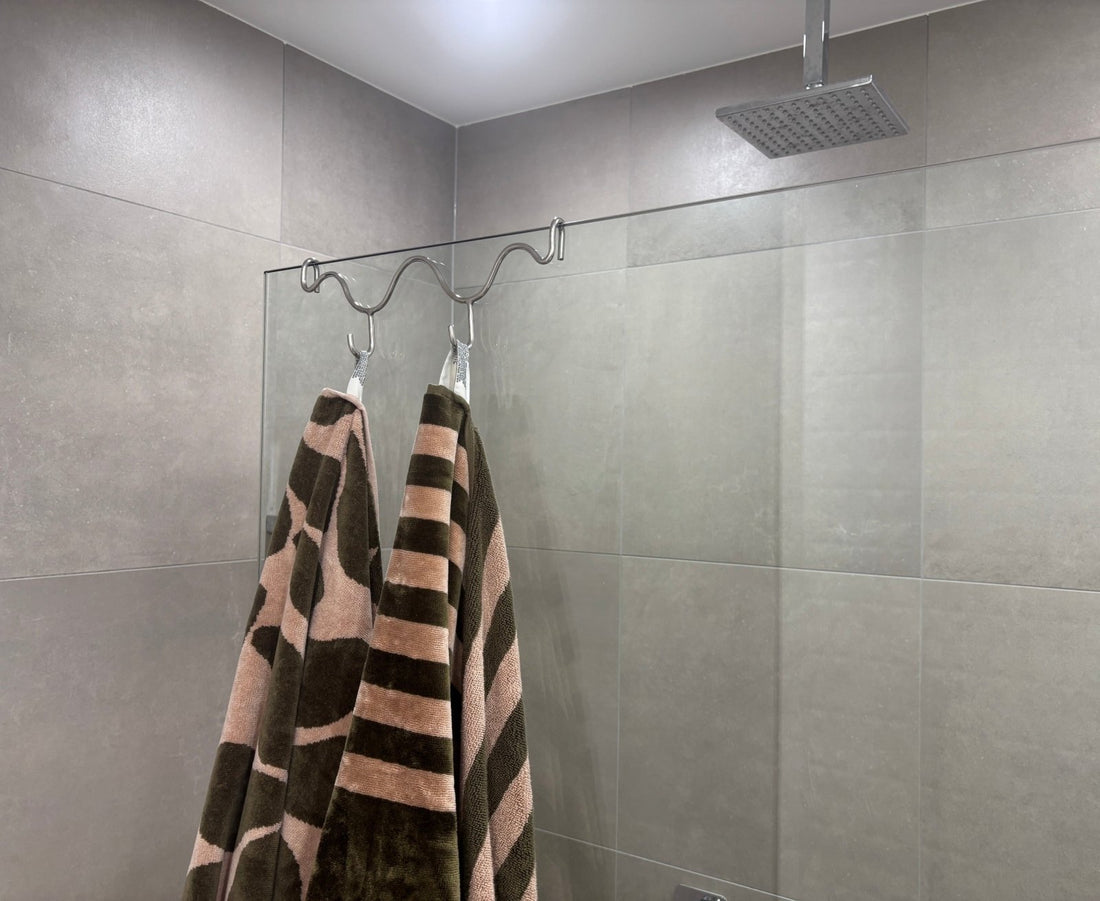 Not Just for Pool Fences: A Stylish Storage Solution for Frameless Shower Screens