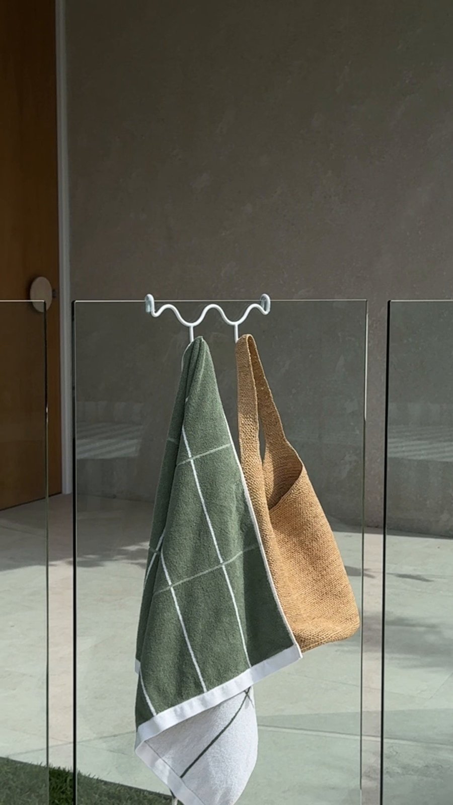 Where Do You Hang Towels Around a Glass Pool Fence?